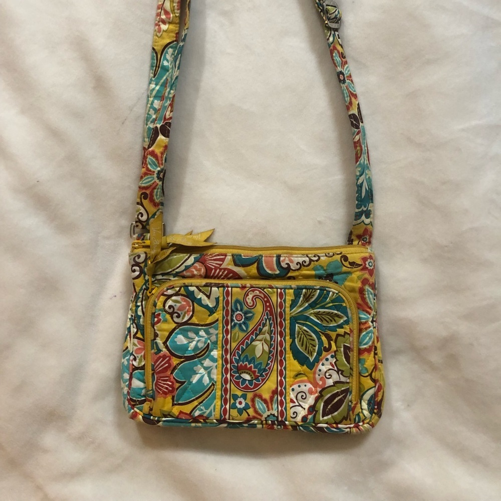 Vera Bradley handbag with adjustable strap.